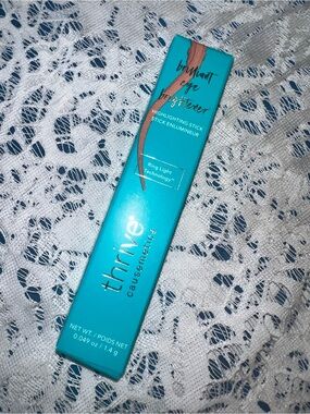 Thrive brilliant eye brightener, highlighting stick RUTH peach bronze shimmer
